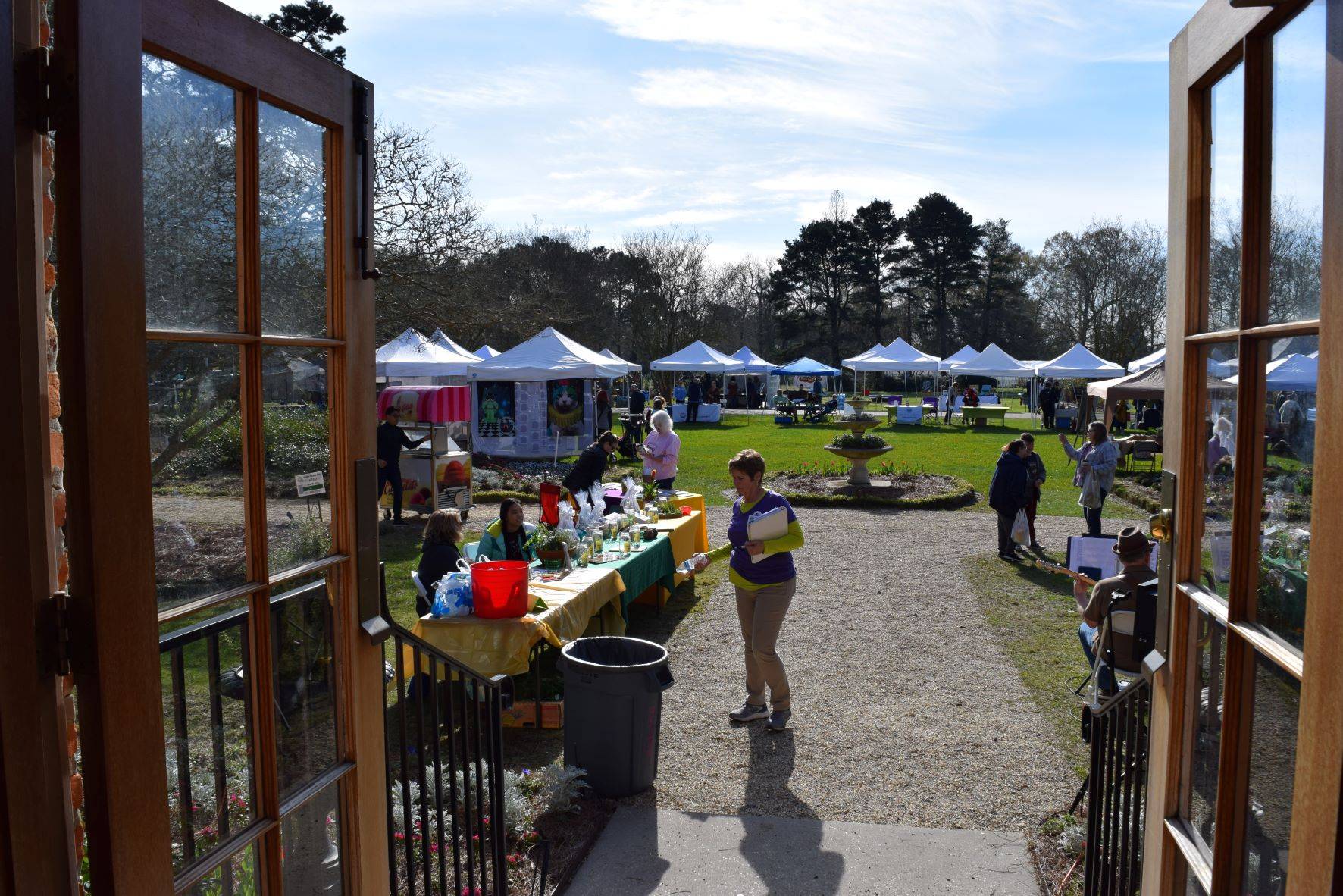 people buying herbs at the sale 