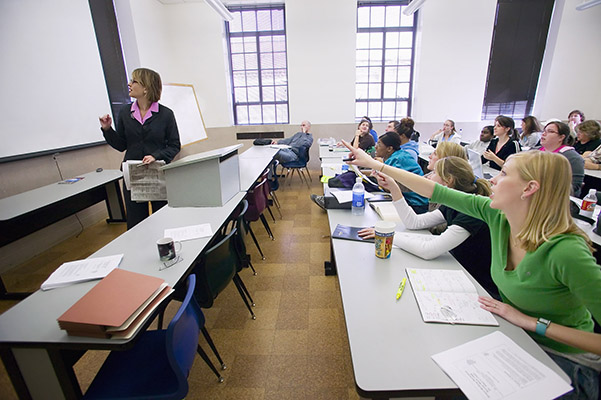 Photo of Lilly Allen teaching a social work class.